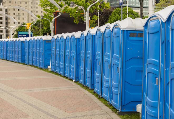 a line of portable restrooms set up for a wedding or special event, ensuring guests have access to comfortable and clean facilities throughout the duration of the celebration in Hoffman Estates